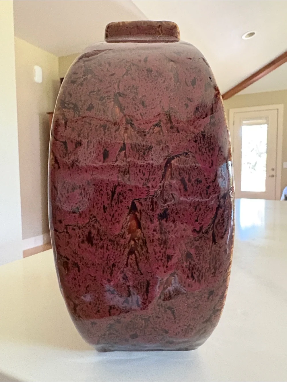 Red Decorative Ceramic Accent Vase with Gold Emblem